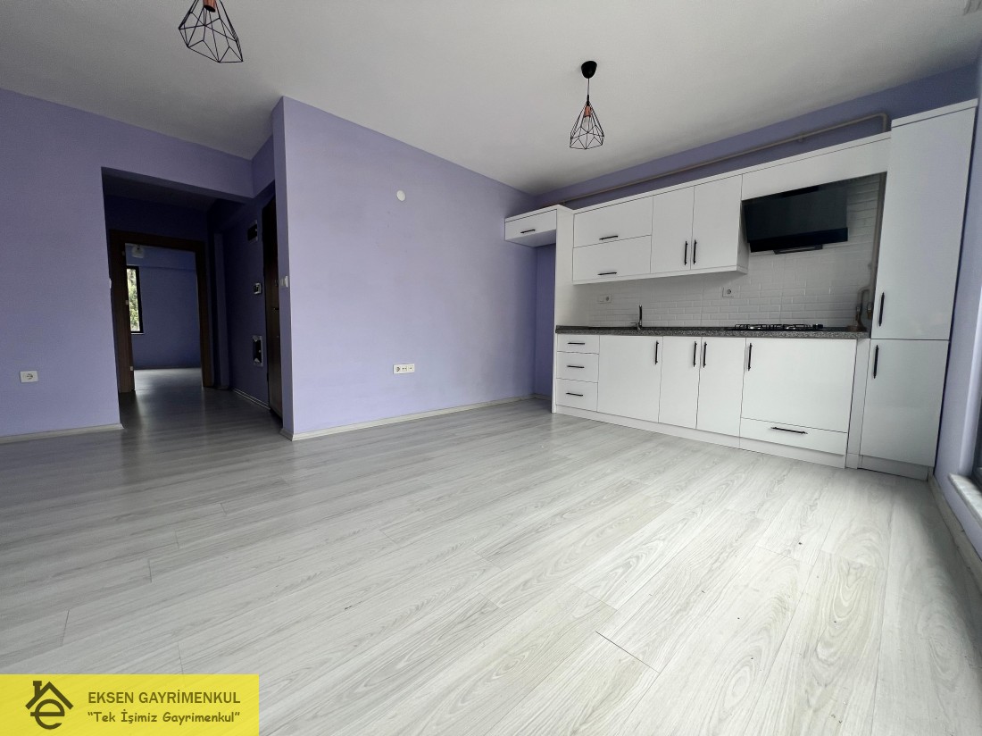 ERDEMİR CADDESİ ÜZERİNDE SIFIR AYARINDA KİRALIK  1+1DAİRE