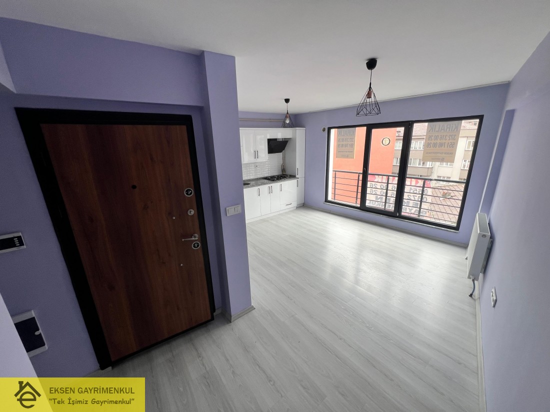 ERDEMİR CADDESİ ÜZERİNDE SIFIR AYARINDA KİRALIK  1+1DAİRE