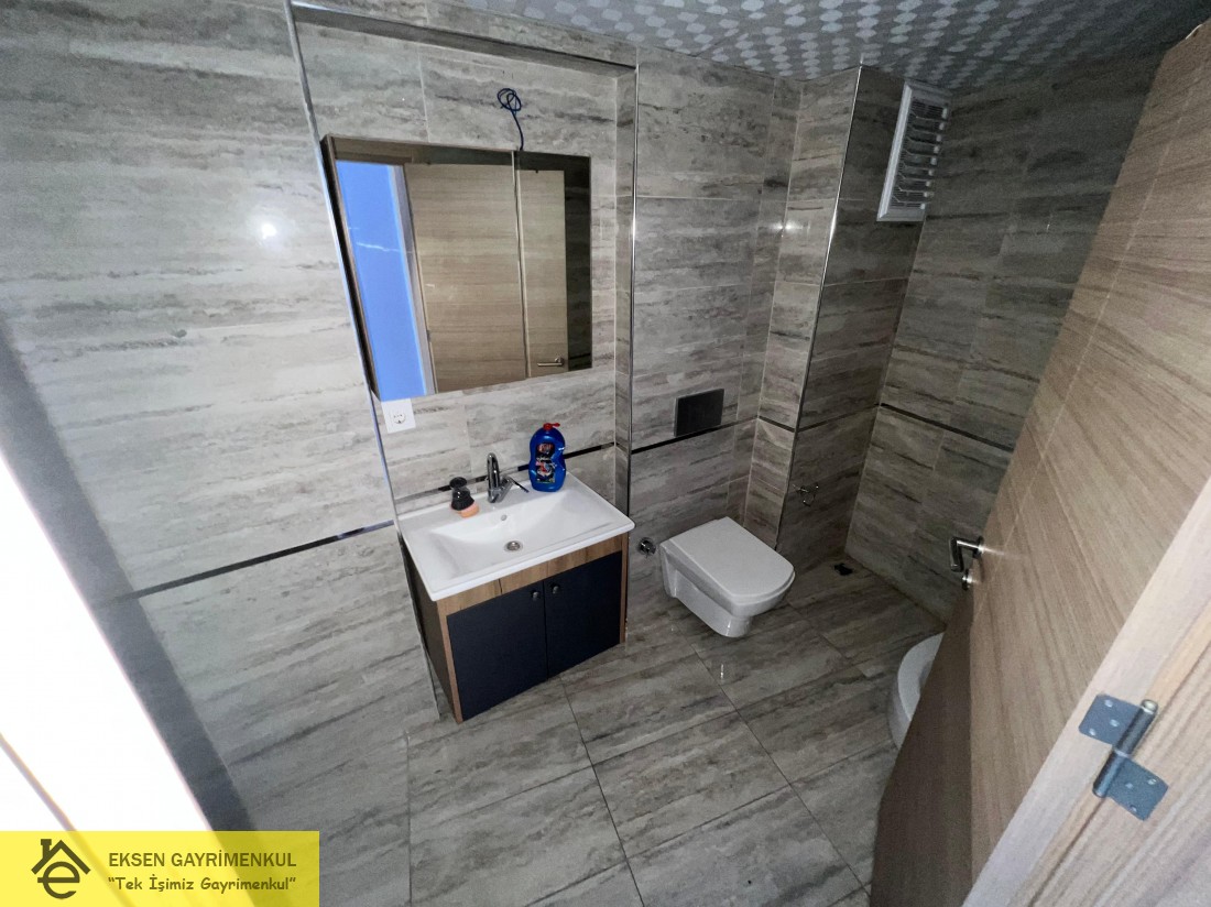 ERDEMİR CADDESİ ÜZERİNDE SIFIR AYARINDA KİRALIK  1+1DAİRE