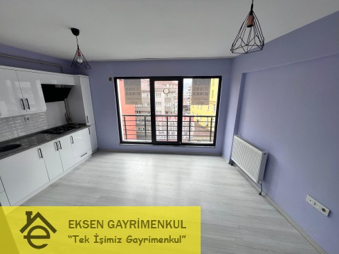 ERDEMİR CADDESİ ÜZERİNDE SIFIR AYARINDA KİRALIK  1+1DAİRE