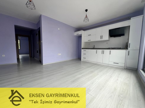ERDEMİR CADDESİ ÜZERİNDE SIFIR AYARINDA KİRALIK  1+1DAİRE