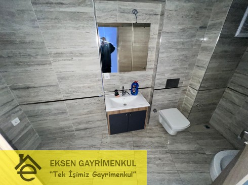 ERDEMİR CADDESİ ÜZERİNDE SIFIR AYARINDA KİRALIK  1+1DAİRE