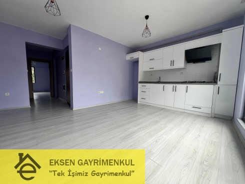 ERDEMİR CADDESİ ÜZERİNDE SIFIR AYARINDA KİRALIK  1+1DAİRE